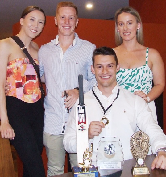 Their first Moonee Valley presentation night - and hopefully not their last: Sam Younghusband (sitting) and Michael Oddie and their partners.