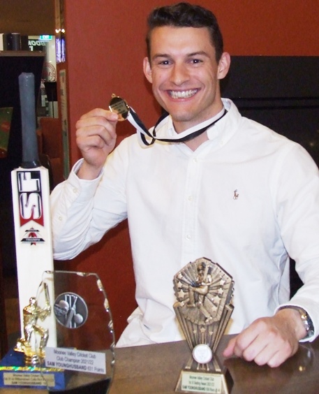 Sam Younghusband with his collection of trophies - a century bat, Most Valuable Player award, Club Champion and First Eleven batting award.