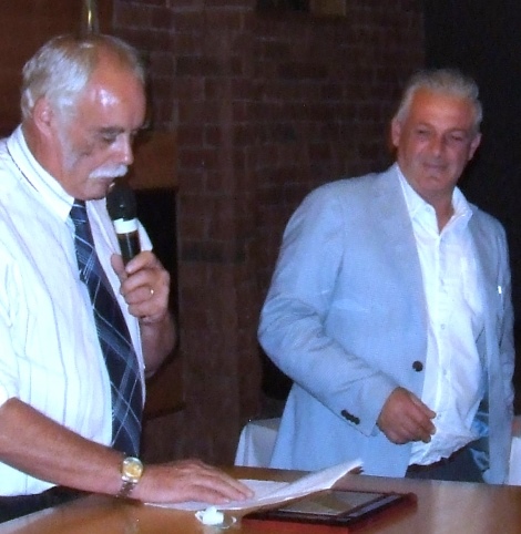 Club President Charlie Walker (left) reads his citation announcing Dom Gibaldi as recipient of our Lindsay Jones Award.
