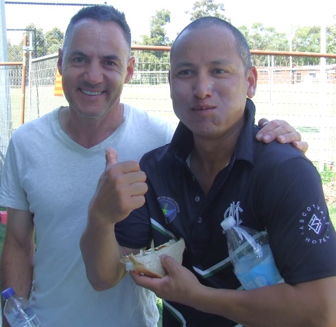 One of our key sponsors - Nelson Alexander Real Estate partner Sam Carbone (left) with First Eleven player Chand Shrestha.