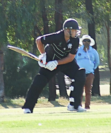 Max Jones prepares to hit out.