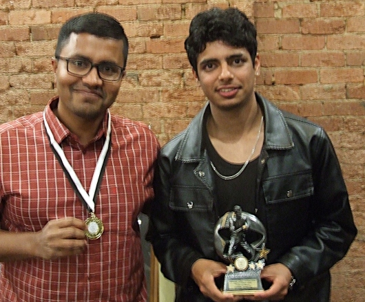 Maks Rahman (left) and Vansh Tandon with their awards.