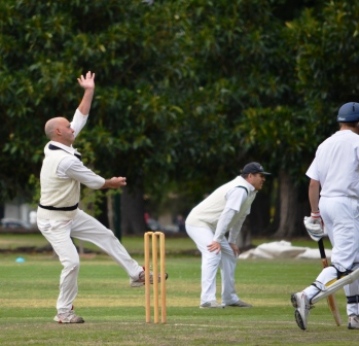 Lou Raffaele got plenty of movement opening the bowling. Ian Denny waits watchfully for a chance.