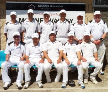 Our Seconds team - in Nelson Alexander caps, and in front of the company's sponsor board at our Ormond Park clubrooms. 