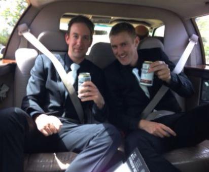 Enjoying more than the limousine ride: Ben Thomas and Sam Bishop arrive at Wardy's wedding in style.