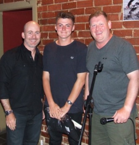 Presentation: Club Secretary Adam Patchell (left) and Vice President Simon Thornton (right) presented Kazi Elias with a mini bat and a Club windcheater as he was about to head home to England.