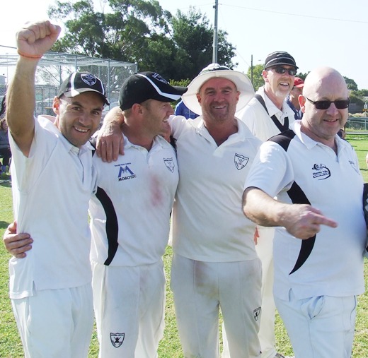 It's a Grand Old Flag - celebrating the Sixths Premiership are L-R Sam Carbone, Peter and Sean O'Kane, Kevin Gardiner and Paul Hobbs.