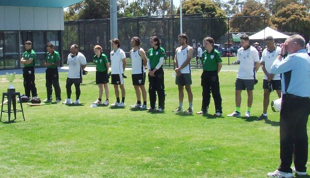 Moonee Valley's line-up to honor the Webb-Johnson/Pascu Cup on December 12 - L-R Sam Younghusband, Jordon McDonald, Glen Courts, Zac Nilsson, Dejan Gilevski, Alec McIntyre, Anthony Cafari, Luke Brock, Charles Bibby, Jack Newman and Sunil Bhandari, with umpire Neil Dey.