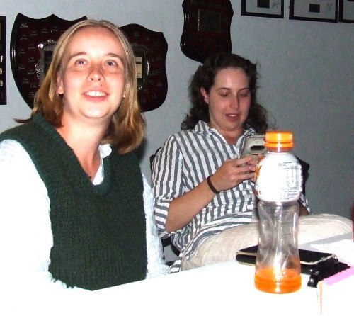 Checking the leader board - Fiona Bathie (left) with captain Sarah Fenn.