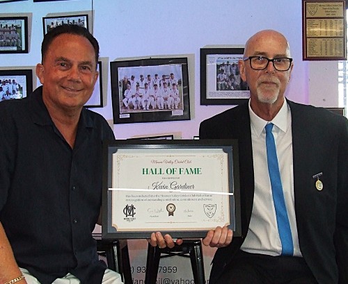 Inductee Kevin Gardiner (right) receives his Hall of Fame certificate from Life Member Bill Nagel.